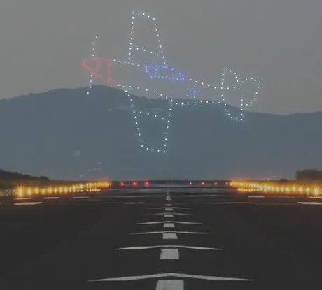 P-51 aircraft drawn by drones at an airshow drone light show